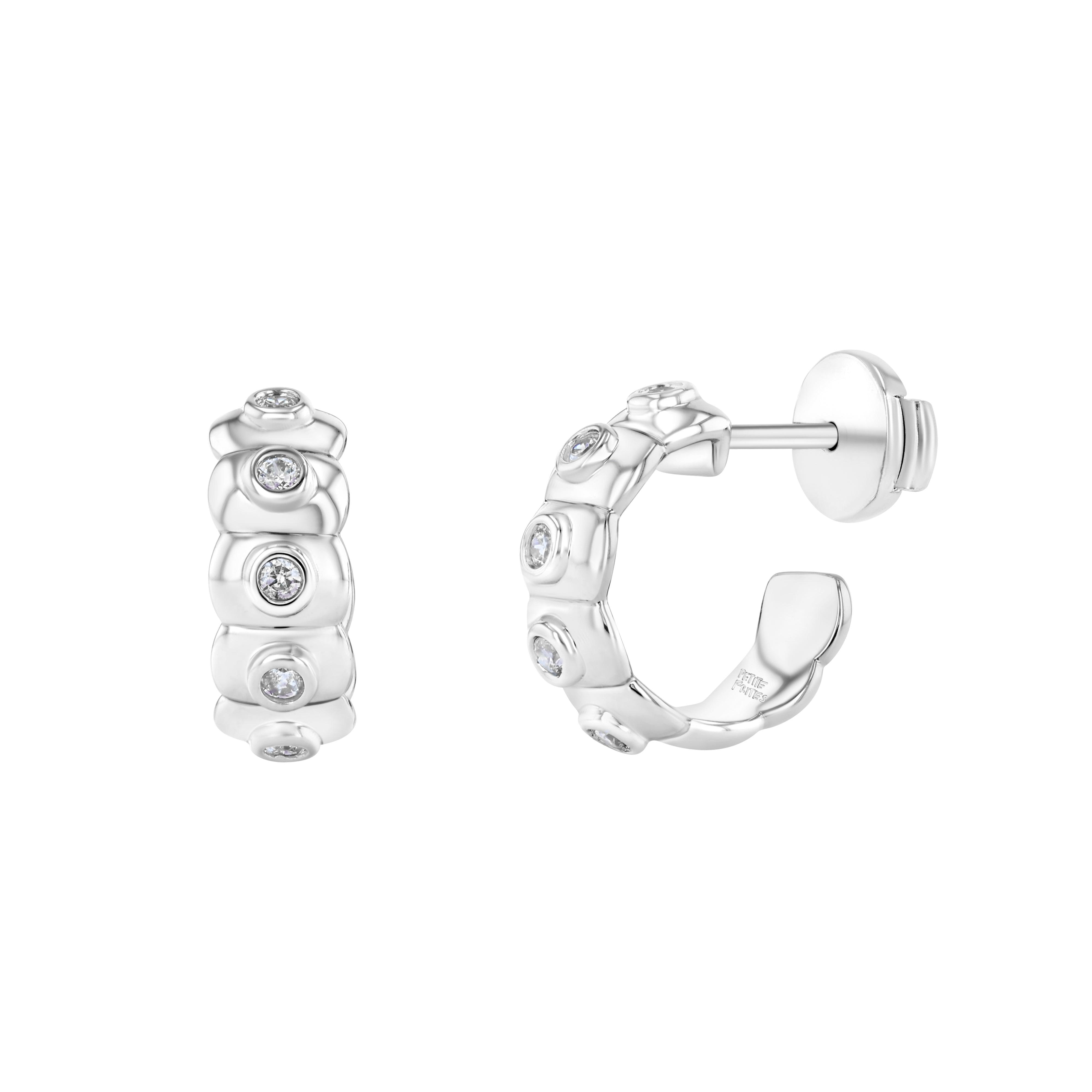 A pair of round diamond-studded earrings in white gold