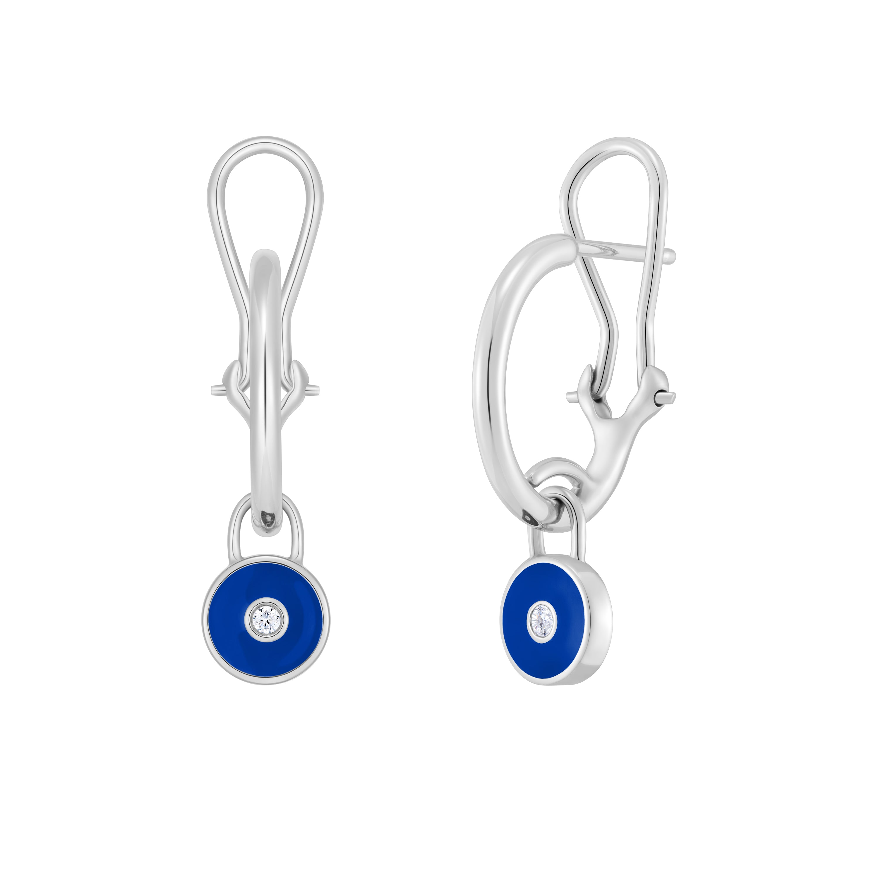 Silver earrings with blue circular stones on a white background