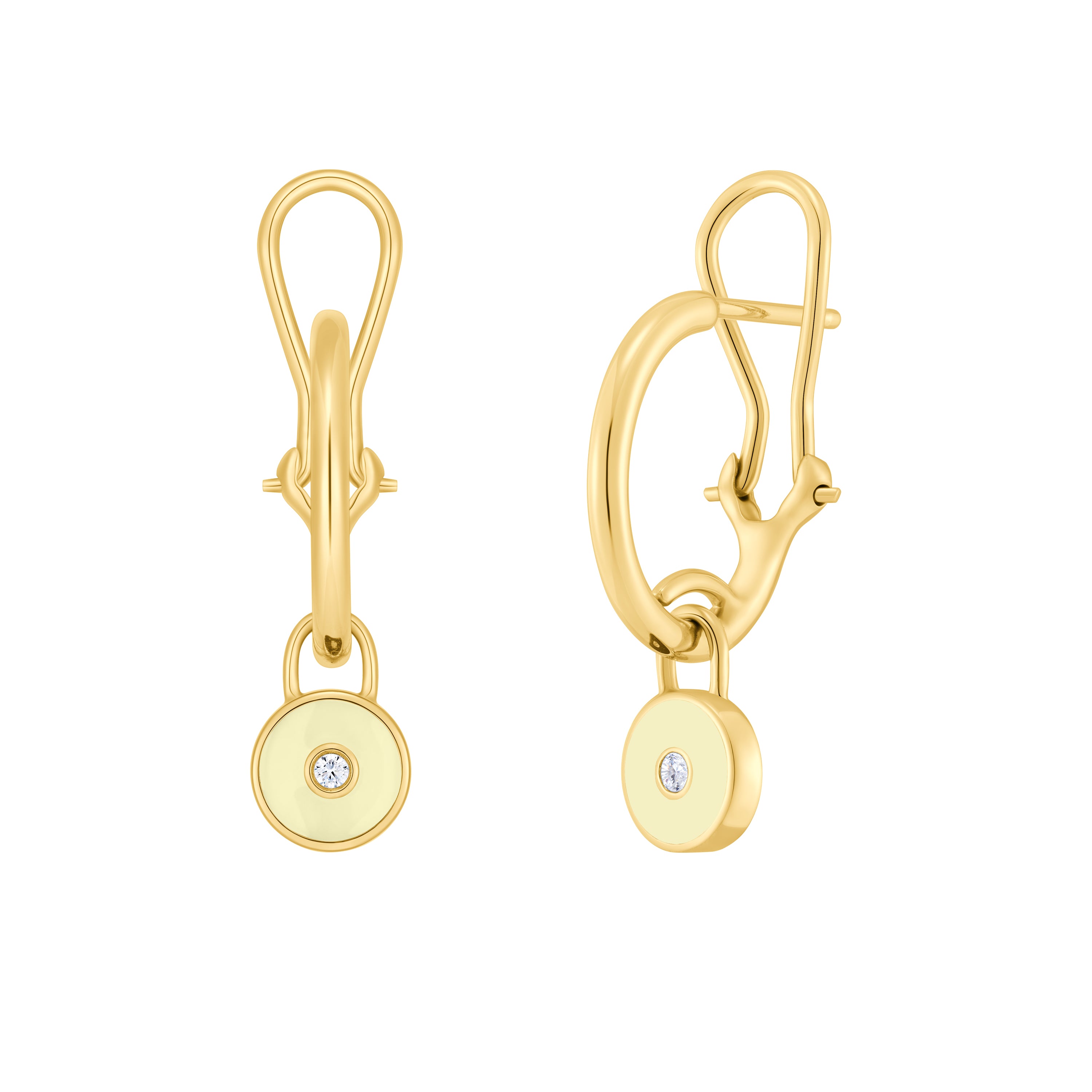 Gold earrings with round pendants on a white background