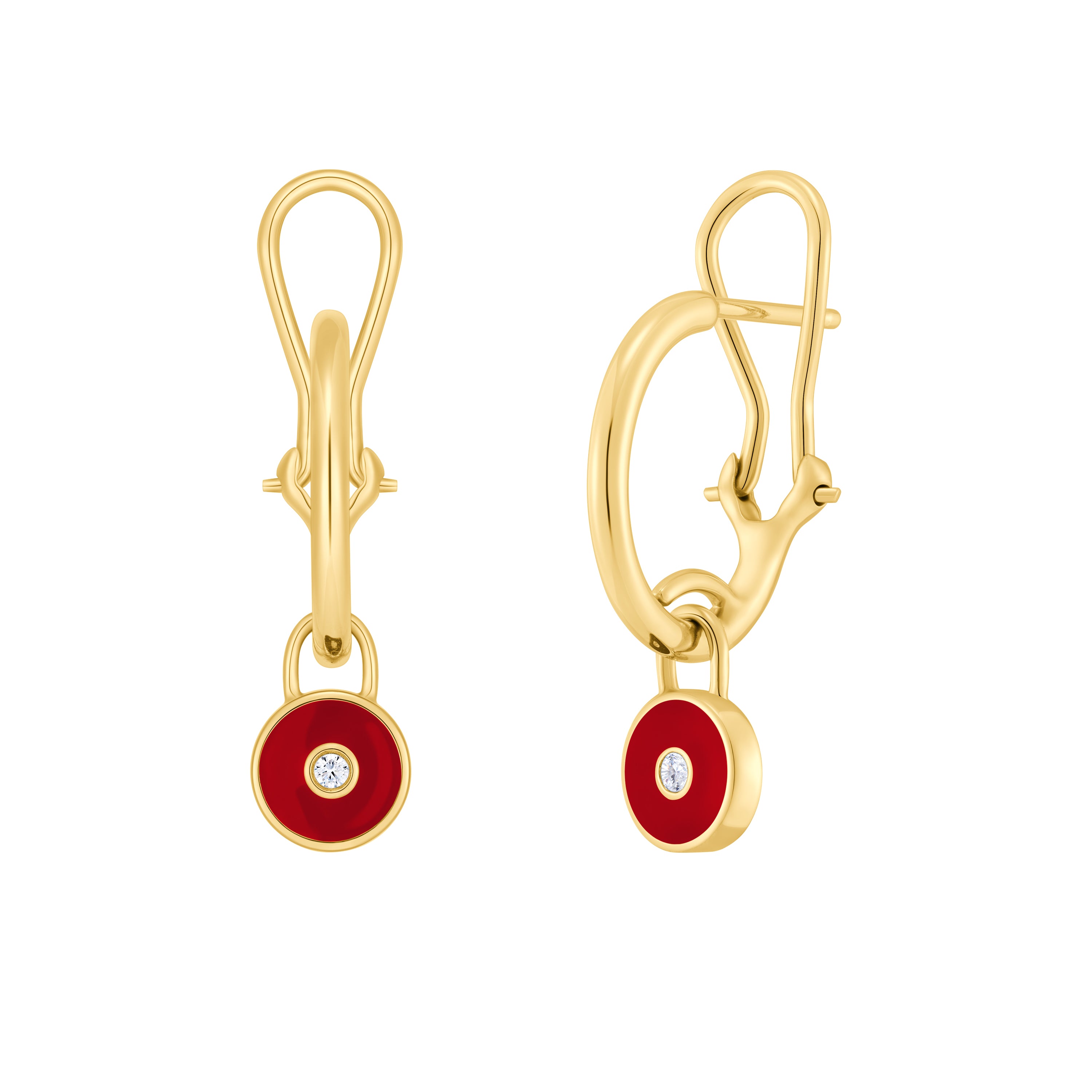 Gold earrings with red circular drops and clear gemstones on a white background